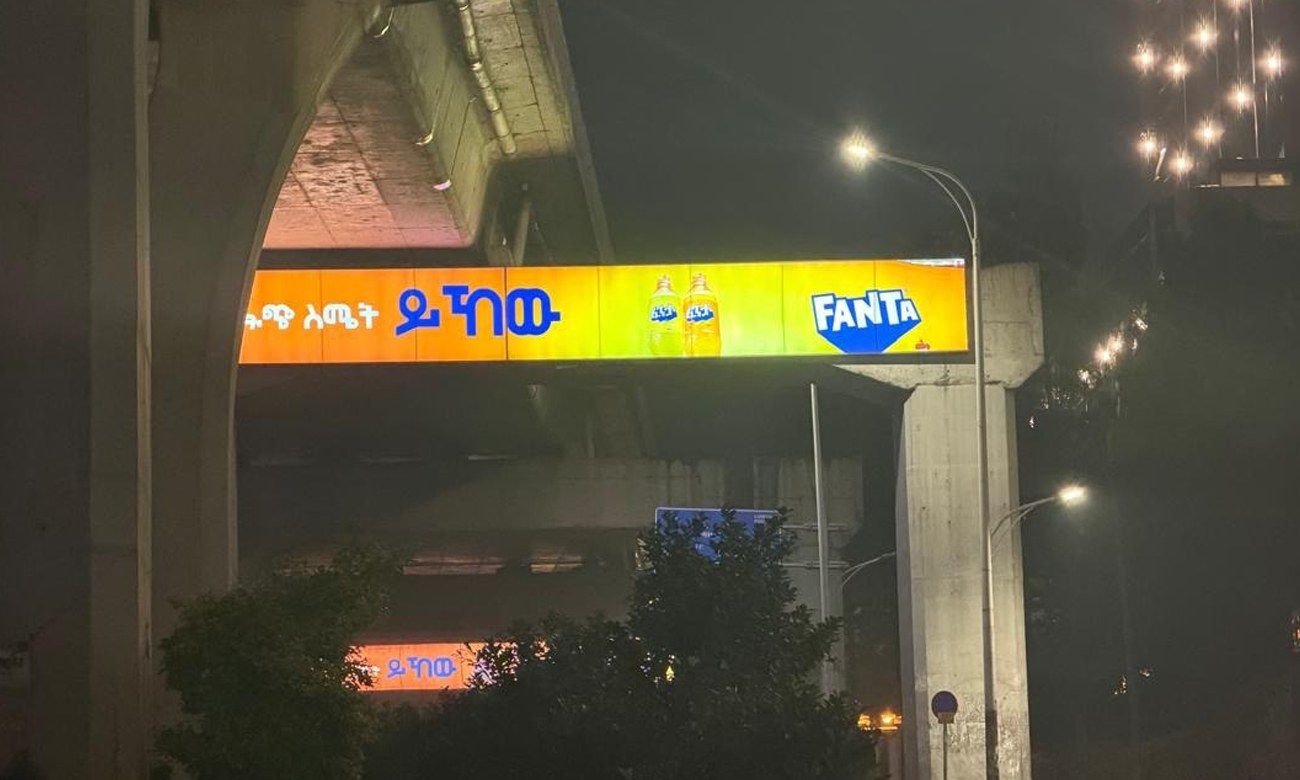 Fanta bridge signage at night